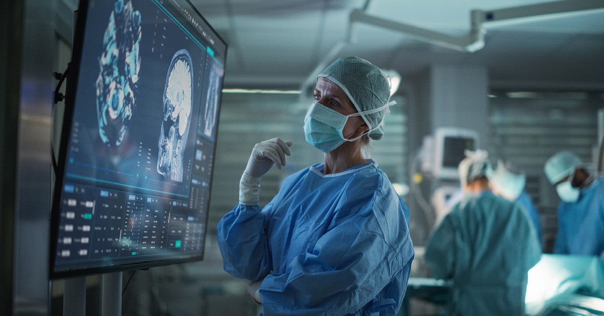 neurologist looking at an xray