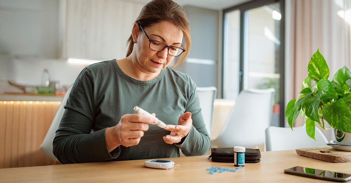 Women testing her insulin levels