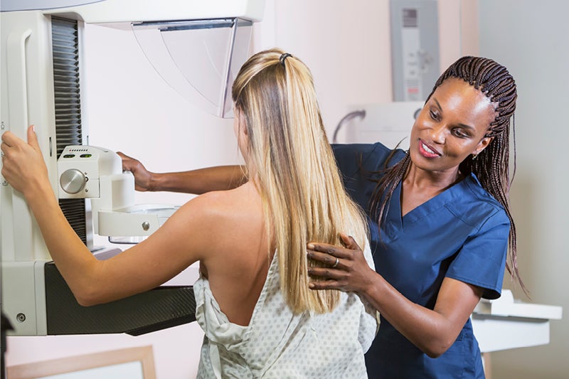 Women recieving a mammogram