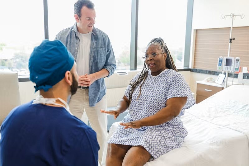 women meeting with doctor