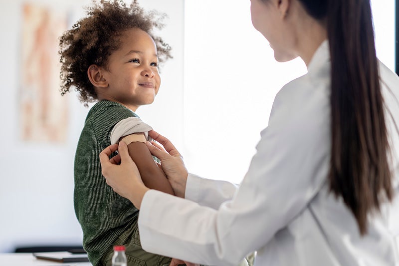 Doctor and a smiling child