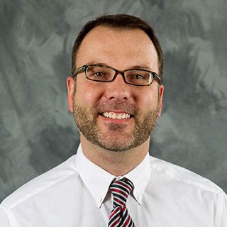 Michael L. Woltman,