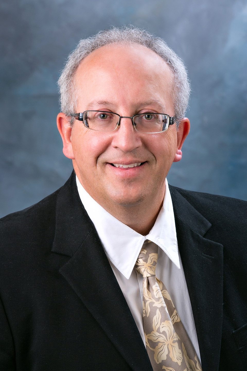 Rick L Garrels, MD