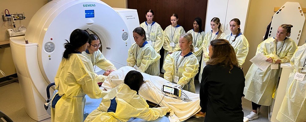 GAIN Campers treat mock patient.