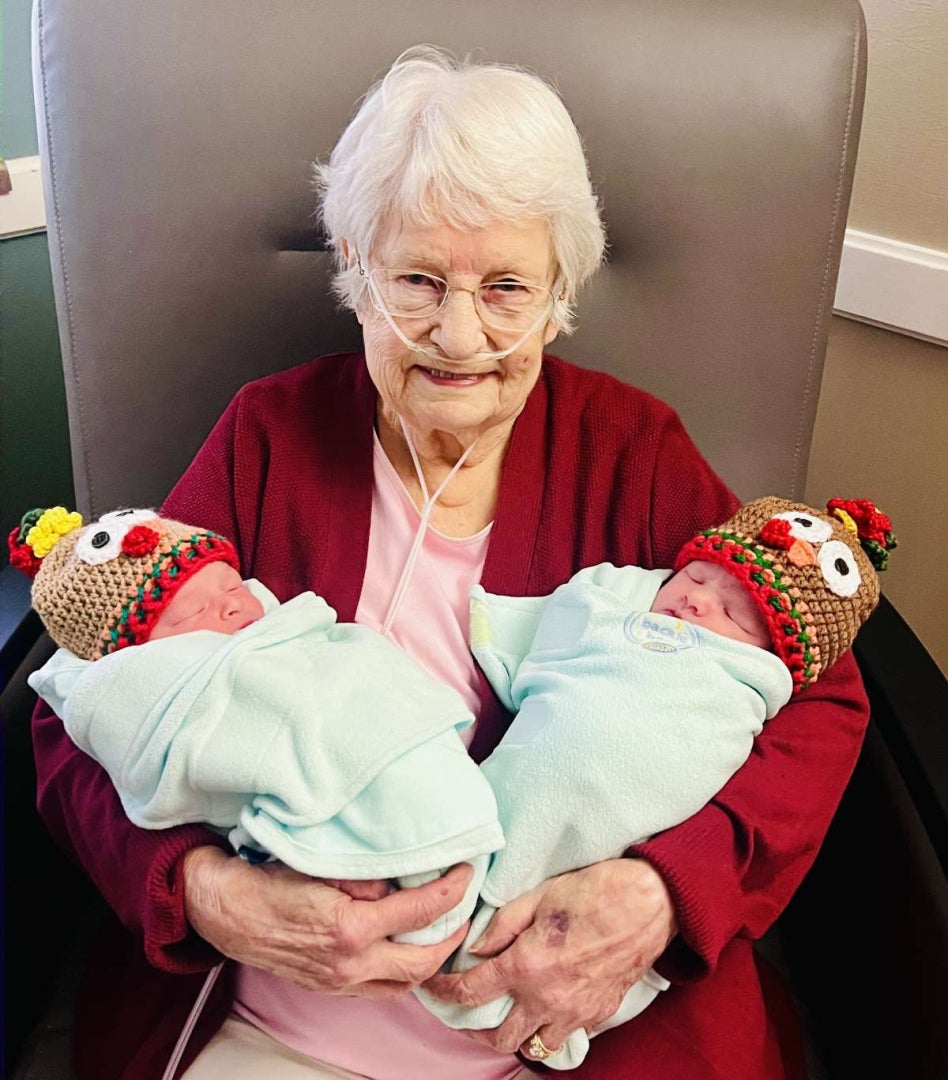 Sherry Zurn of Mason City holds her twin great, great-great-grandbabies at MercyOne North Iowa Medical Center in Mason City.