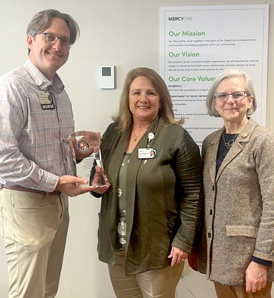 A photo of : Robert Wethal, Chief Nursing Officer; Sue Meade, VP of Professional and Support Services; and Liz Summy, FACHE, the AHA Regional Executive.