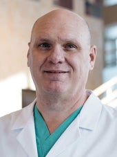 Alan McDaniel, MD