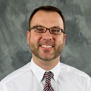 Michael L. Woltman,